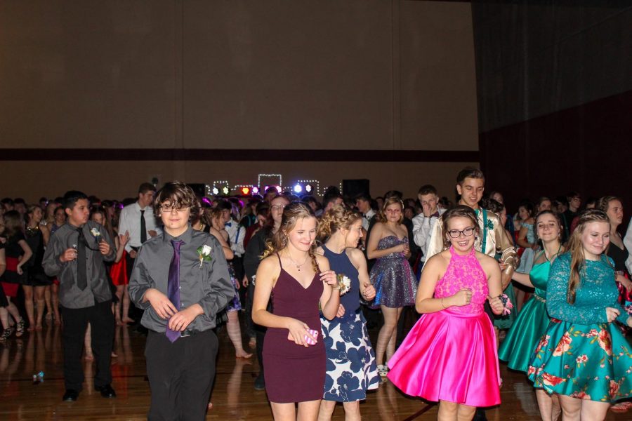 Students at the 2019 Sweetheart Dance enjoy one of several line dances during the night.