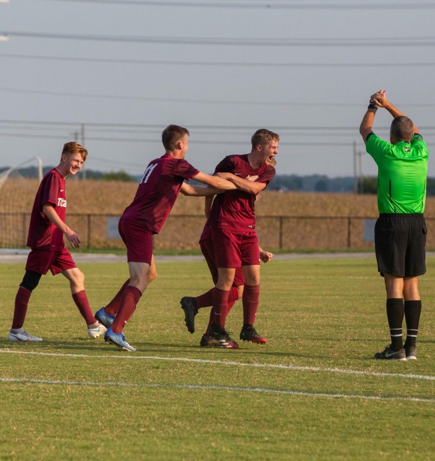 The Titans celebrate a goal against Central.