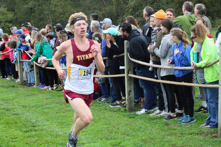 Sophomore+Alex+Spindler+enjoys+a+break+from+the+pack+in+the+final+leg+of+the+Semi-State+cross+country+course.+Spindler+ended+his+season+with+a+PR+of+16%3A47.3.