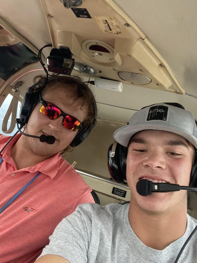 Junior+Bradyn+Epperson+is+all+smiles+on+his+first+flying+lesson+with+Gibson+Southern+Graduate+Brant+Elpers.+Elpers+is+an+instructor+at+Excell+Aviation+in+Evansville.