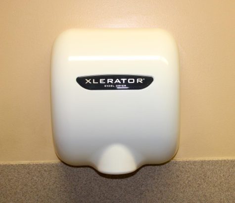 Hand dryers are the only option to dry ones hands in the bathrooms. Paper towels are more sanitary and are quicker.