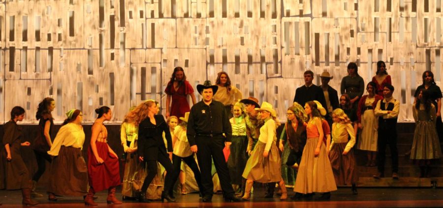 Full cast preforming "Showdown."