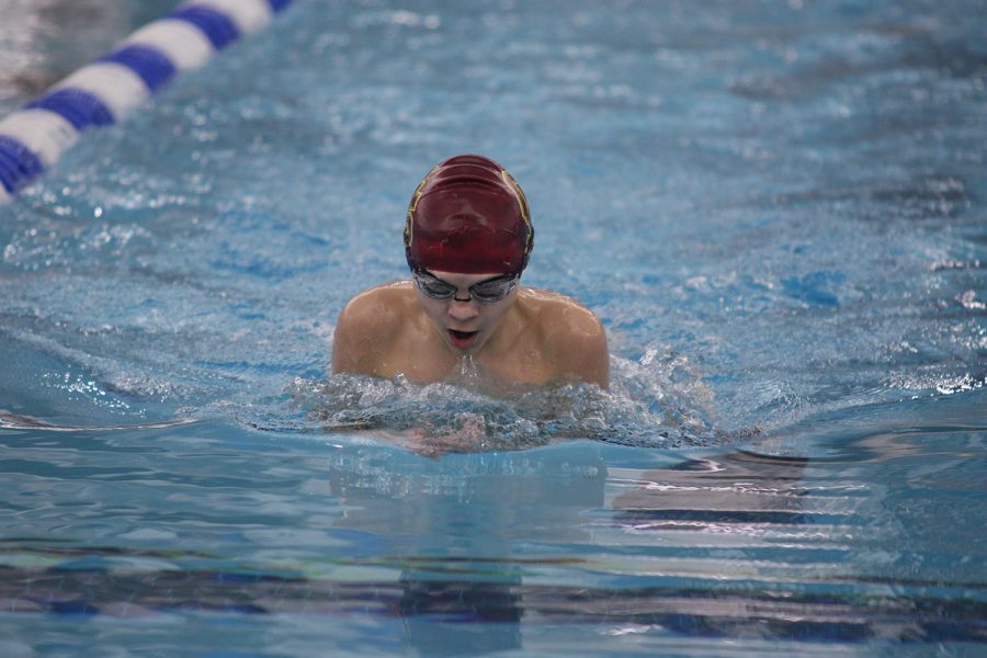 Freshman+Gavin+Fulcher+swims+the+100-yard+breaststroke+in+the+Sectional+20+prelims+at+the+Deaconess+Aquatic+Center.