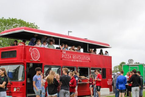 Students enjoy socializing and having an afternoon out of class on the top of Pizza Revolution. 