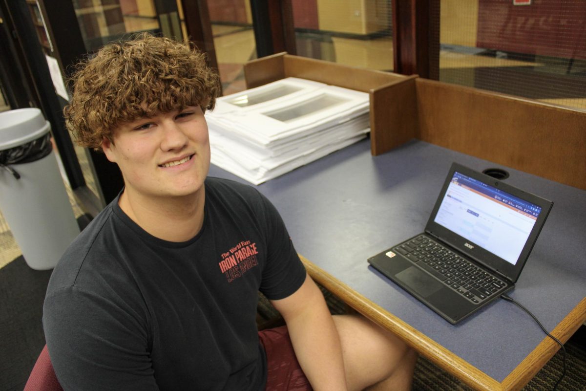 Most students, like senior Brayton Reinhart, have no issue looking at their report cards through Skyward. Students will no longer receive a paper copy of their report cards unless they ask for it from the audience.