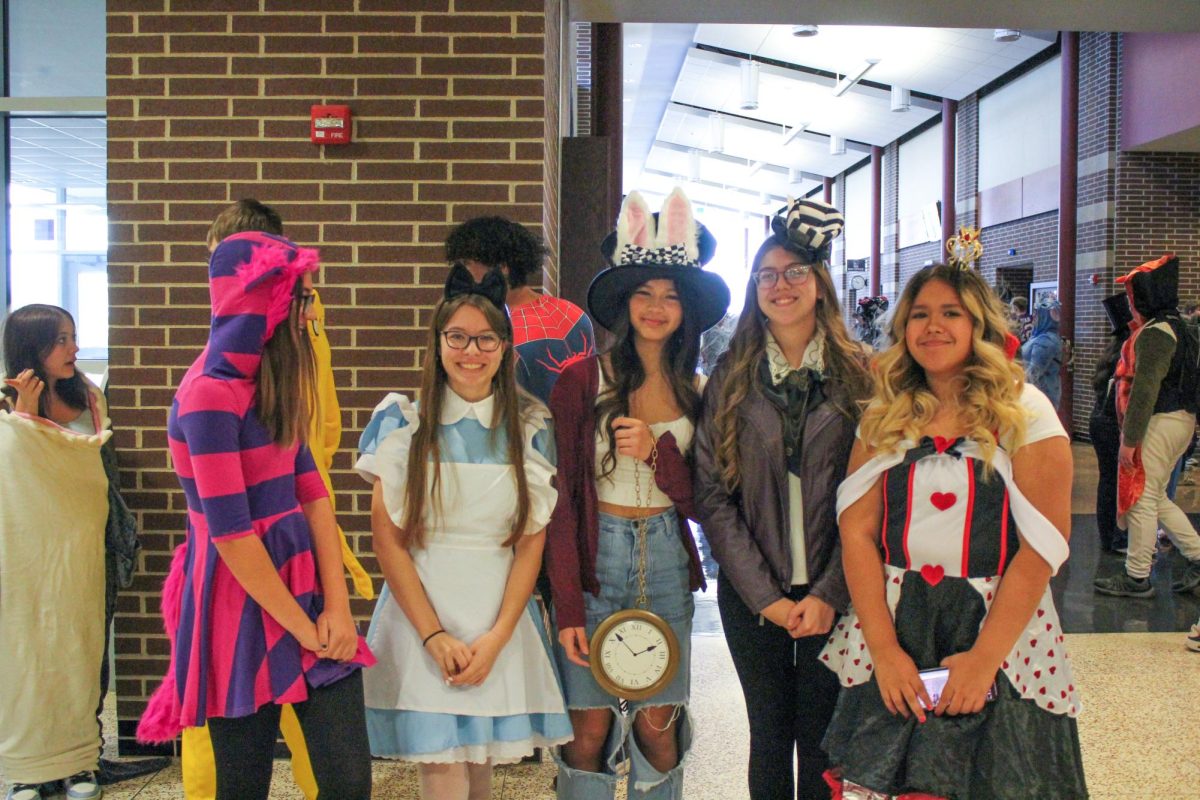 Freshmen Erica Narruhn, Emma Schleter, Greenlee Powers, Evelyn Anderson and Glinde Huante won the Best Group Costume category portraying characters from Alice in Wonderland.