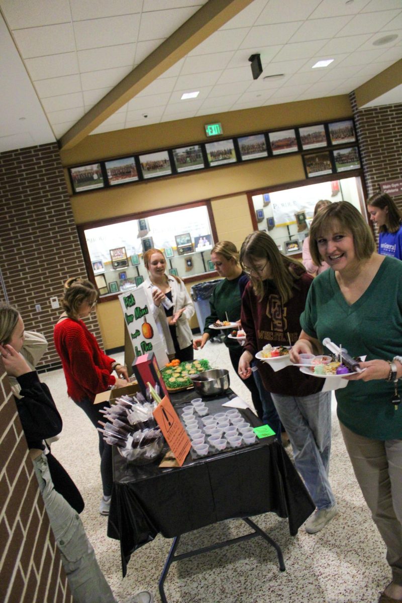 Titan faculty members enjoyed sampling and voting for their favorite Halloween Wars displays and treats.