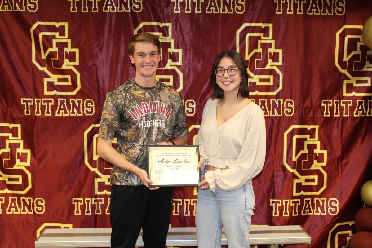 Senior Aidan Loveless was selected by the editorial staff of The Southerner as the inaugural Student of the Month in October 2023. The Southerner editor-in-chief, Eva Spindler, presents Loveless with his award. He was also awarded $50 cash from the Gibson County SROs.