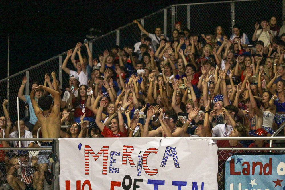 The Titan student section shows school spirit in their red, white and blue attire.