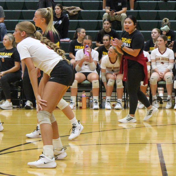 Sabrina Yamashita shouts directions to her Lady Titan volleyball team in their game against North High School.