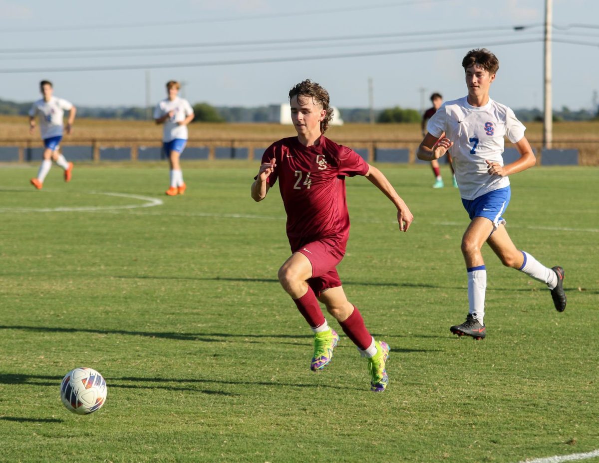 In the September 5 game against South Spencer, sophomore Evan Maikranz drives down the pitch into Rebel territory. The Titans won 5-1.