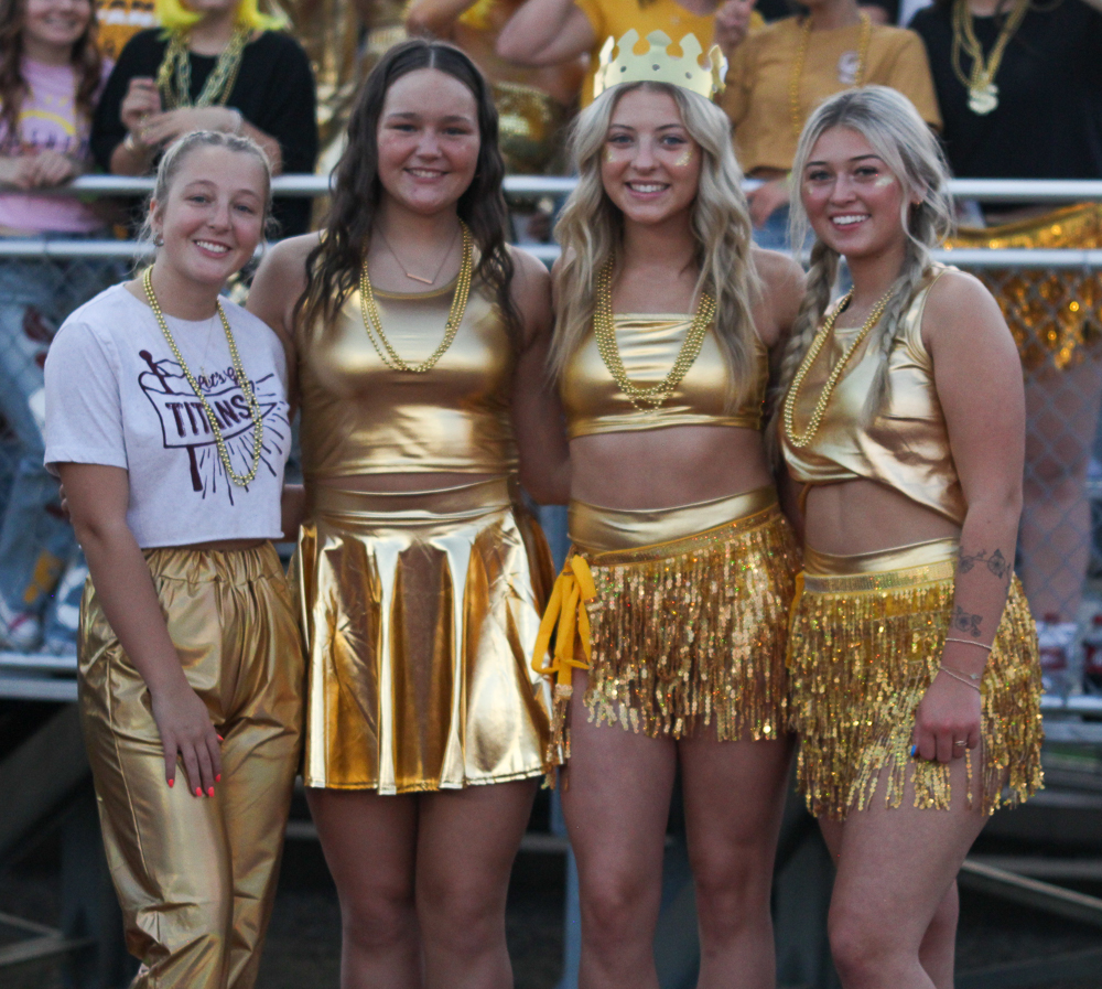 The theme for the day was metallic gold, celebrating the golden anniversary. The student body was creative in how it displayed its spirit. Pictured: Seniors Macey Wilson, Lauryn Adamson, Gabby Spink and Melia Reid.