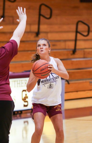 Junior Lilly Bush stays locked in during practice. The girls know this year is one where they have to give their all to compete in class 4A.