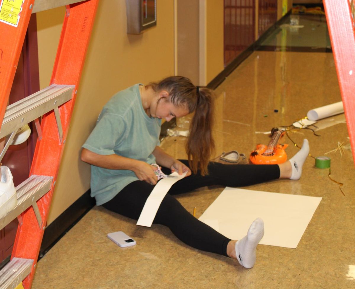 Junior Carly Potts came out to Gibson Southern on Sunday afternoon to help the juniors decorate their hallway in the math wing. The juniors came in second in the hallway decorating contest, while the seniors took first.