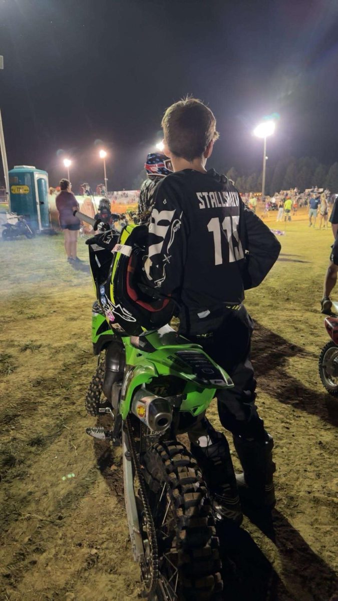 Gibson Southern senior Jacob Stallsmith is taking motocross racing more seriously, entering in more competitions. Here, he gets into the zone before starting a race.