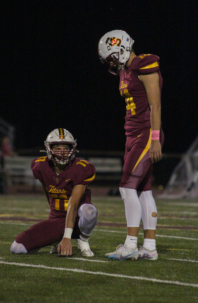 Senior kicker Cam Novotny lines up for the extra point after a touchdown against the Washington Hatchets on October 4.