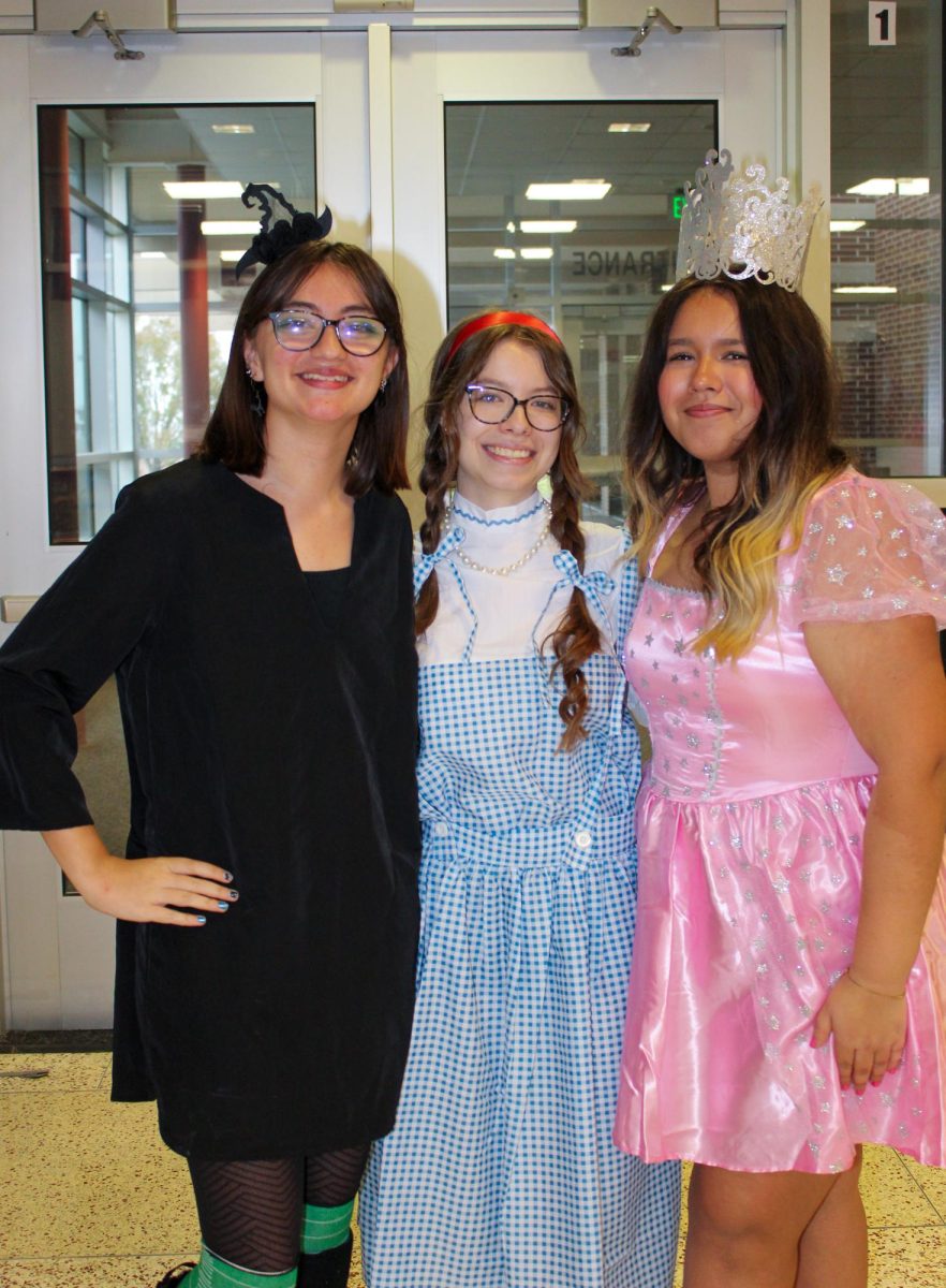 Sophomores Greenlee Powers, Emma Schleter and Glinde Huante dress as "The Wizard of Oz" in the group costume category.