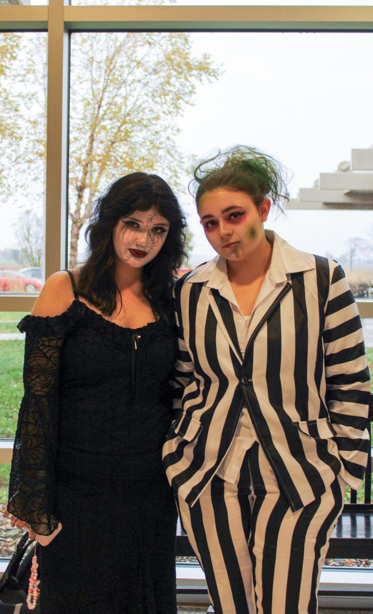 Senior Emily Howell and Camilla Bratcher dress as characters from "Beetlejuice" in the best duo costume category.