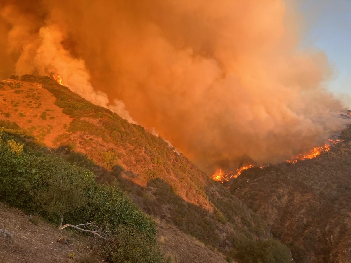 Fires burn out of control in parts of California, flames fueled by winds.