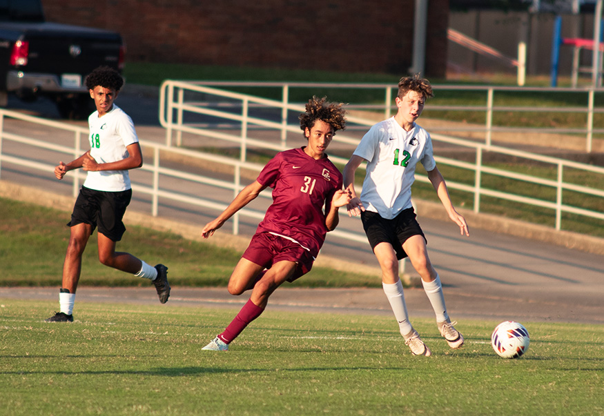 Freshman Matias Ochoa works his way around a North player at The Fort on September 30.