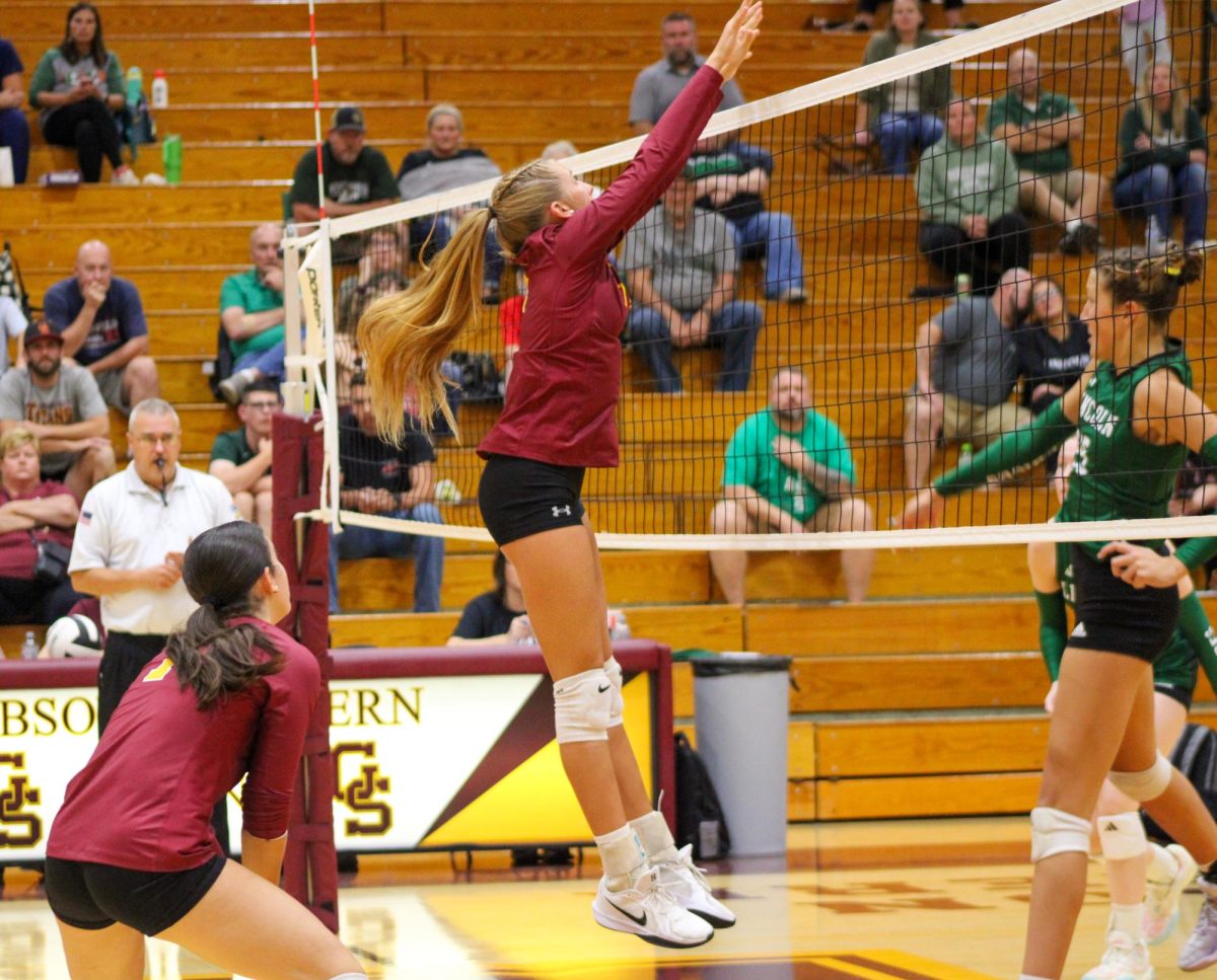 Junior Allie Deal goes up for a block when the Lady Titans hosted Vincennes Lincoln on October 6.
